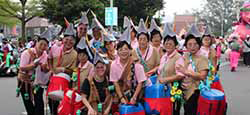 With the locals who built the float